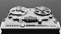 A black and white shot of a Ballfinger M 051 MR reel-to-reel tape machine.