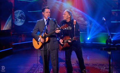 Watch Neil Young and Stephen Colbert's amusing point-counterpoint duet about saving the Earth