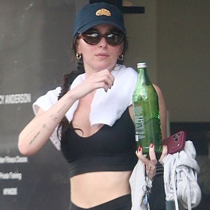 Dakota Johnson was spotted for the first time in 2026 wearing a Lululemon matching set and her favorite Nike V2K sneakers