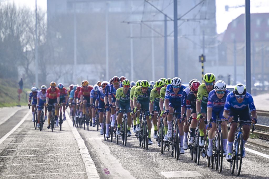 The pack of riders pictured in action during the 'Classic Brugge-De Panne' men's elite one-day cycling race, 198,9 km from Brugge to De Panne, Wednesday 20 March 2024. BELGA PHOTO LAURIE DIEFFEMBACQ (Photo by LAURIE DIEFFEMBACQ / BELGA MAG / Belga via AFP)
