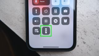 Opening the Apple TV remote app in Control Center