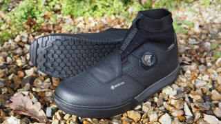 A pair of Shimano flat pedal winter boots