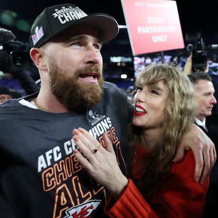Travis Kelce and Taylor Swift celebrate the Kansas City Chiefs' victory against the Baltimore Ravens in the AFC Championship Game at MT Bank Stadium on January 28, 2024 in Baltimore, Maryland.