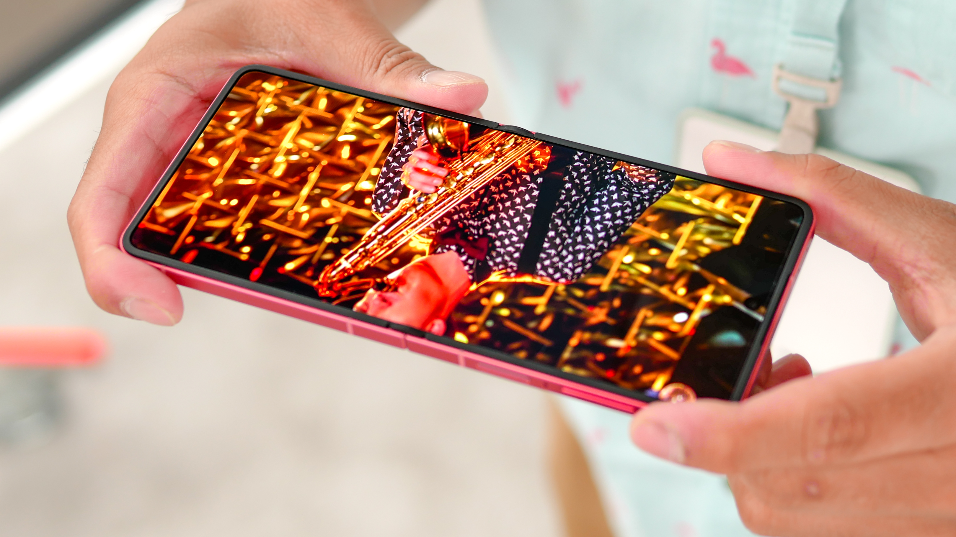 Samsung Galaxy Z Flip 7 held in the hand.
