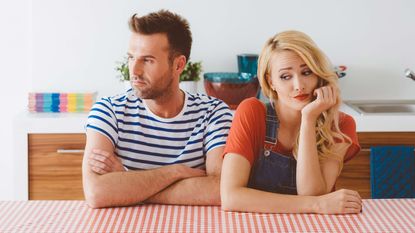 A disgruntled couple refuse to look at each other.