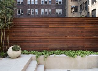 garden fencing ideas with modern brown wooden planks