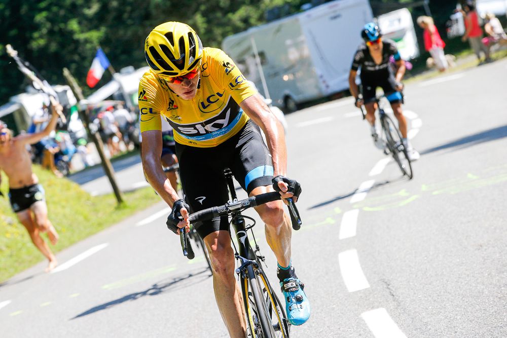 Chris Froome rides away from Richie Porte and Nairo Quintana.
