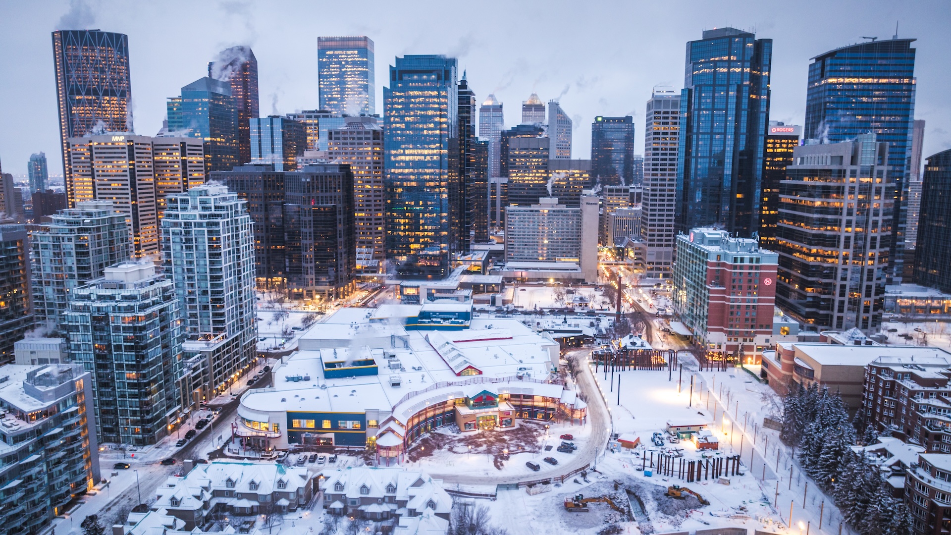 an aerial view of downtown Calgary, Alberta, covered in snow