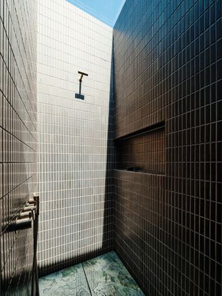 Tiled bathroom with shower