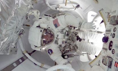 An astronaut is about to exit the International Space Station for a spacewalk.