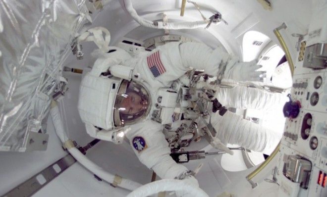 An astronaut is about to exit the International Space Station for a spacewalk.