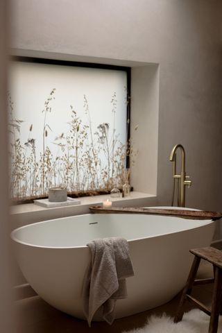 modern bathroom with dried glasses on the windowsill