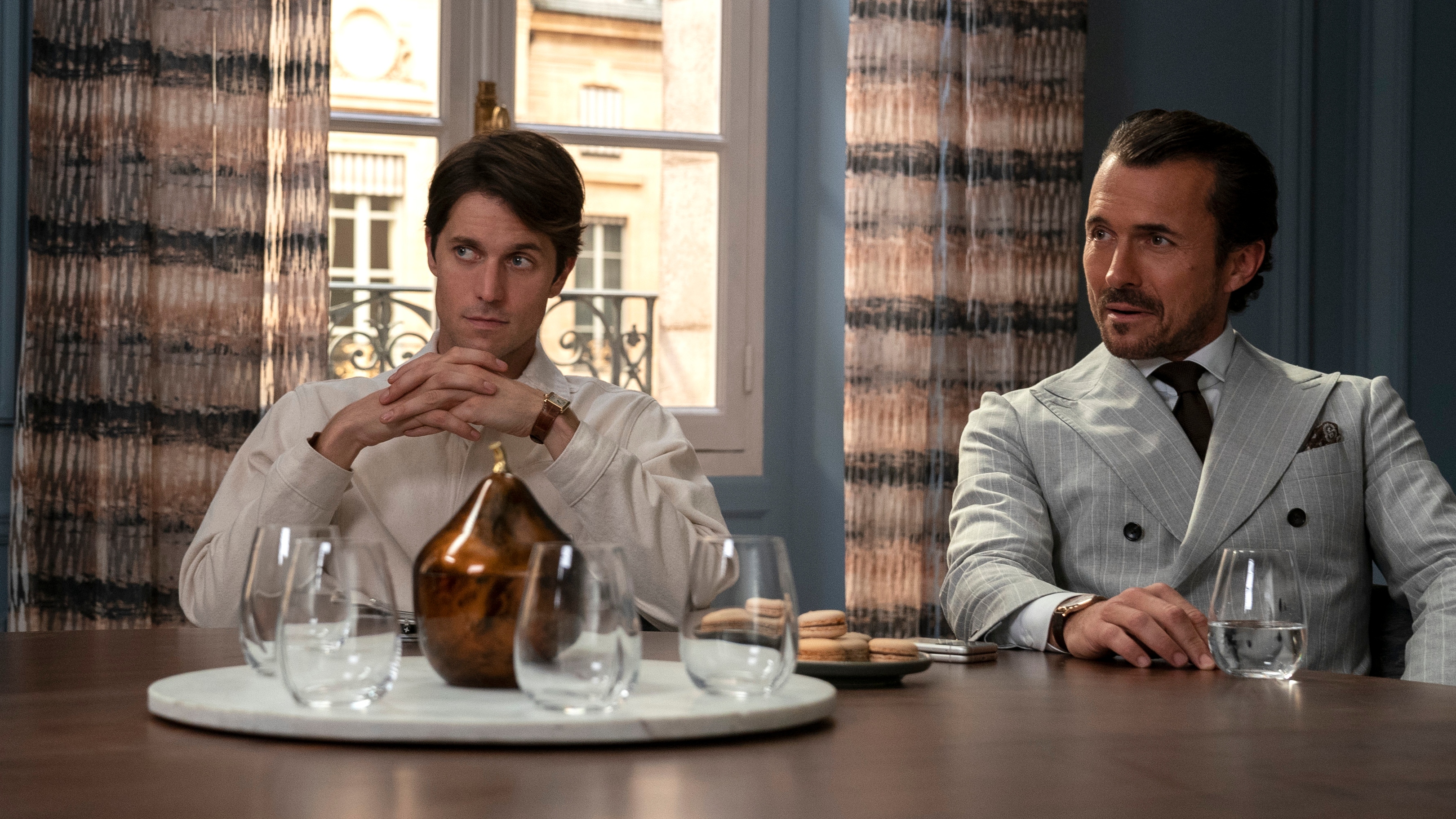 (L to R) Lucas Bravo as Gabriel, William Abadie as Antoine Lambert in Emily in Paris season 3