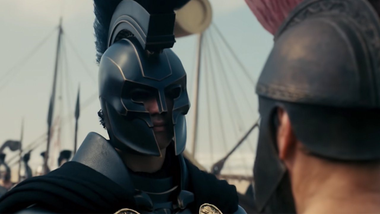 Benny Safdie in a dark helmet with his face mostly obscured in The Odyssey