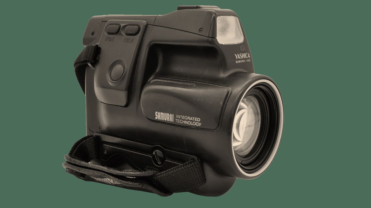 The front of the Kyocera Samurai camera on a green background