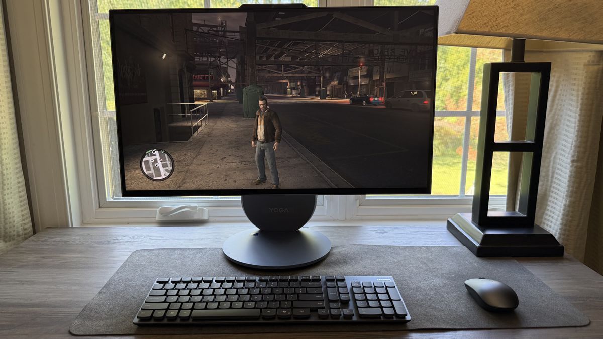 A Lenovo Yoga AIO 27 on a desk playing Grand Theft Auto IV