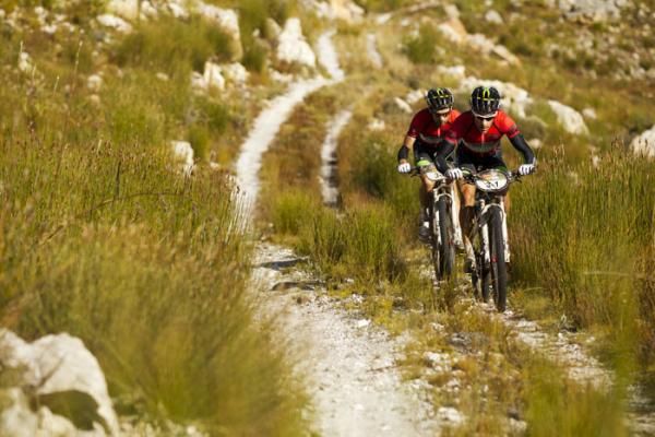 Kevin Evans &amp; David George of Team 360Life climb Groenlandberg on their way to victory