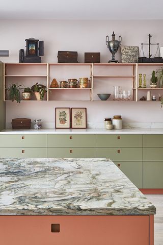 A mid-century inspired kitchen in pale green