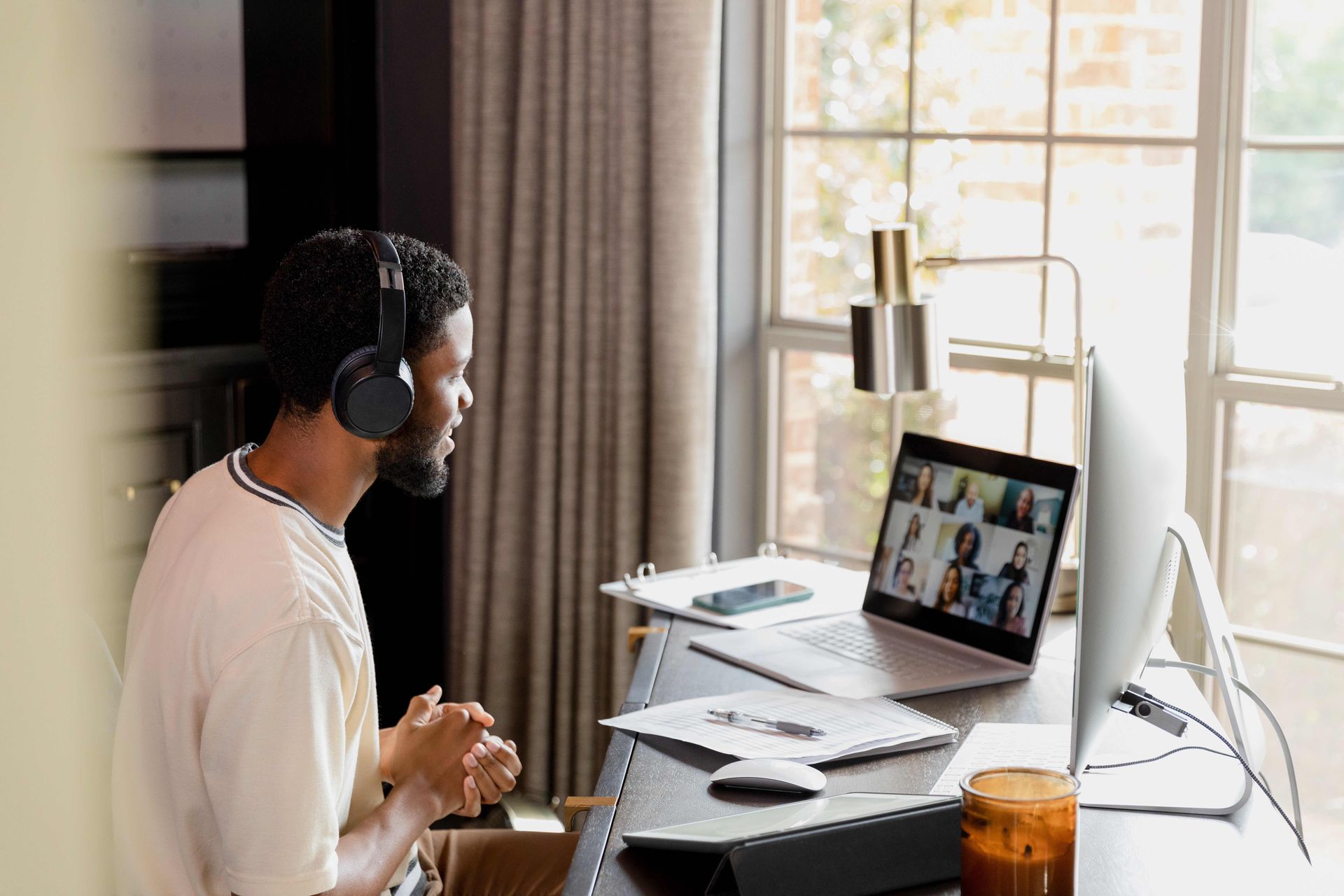 Designer on team call; Figma design report 2023