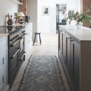 narrow kitchen with rug runner