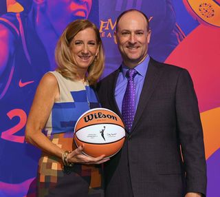 Adam Symson with WNBA commissioner Cathy Engelbert. Scripps added games from the league to its Ion network’s schedule as part of its plan to heavy up on sports content.