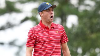 Justin Thomas celebrates a putt during the singles session of the 2022 Presidents Cup