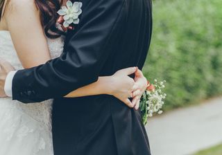 Wedding readings: A newly married couple embrace