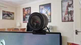 Razer Kiyo Pro Ultra review hero image with the webcam atop a monitor close up