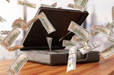 Suitcase full of money and $100 bills flying out for mega millions drawing