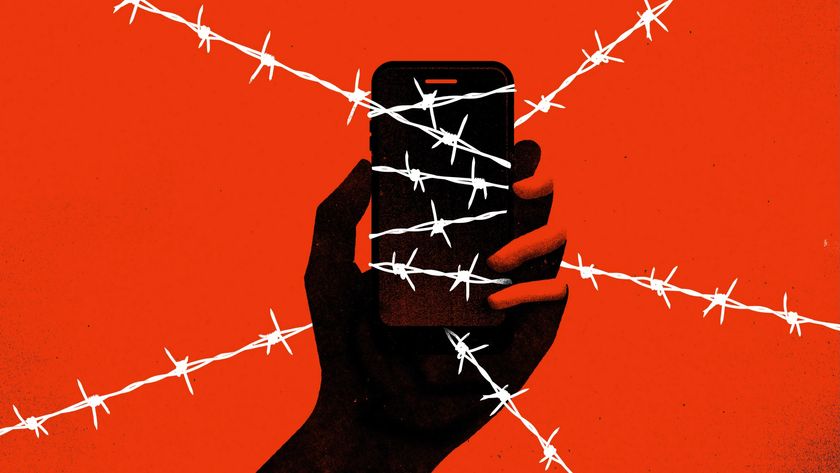 The outline of a hand holding a phone, wrapped in barbed wire to indicate censorship