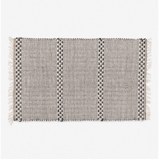 black and grey patterned bath mat