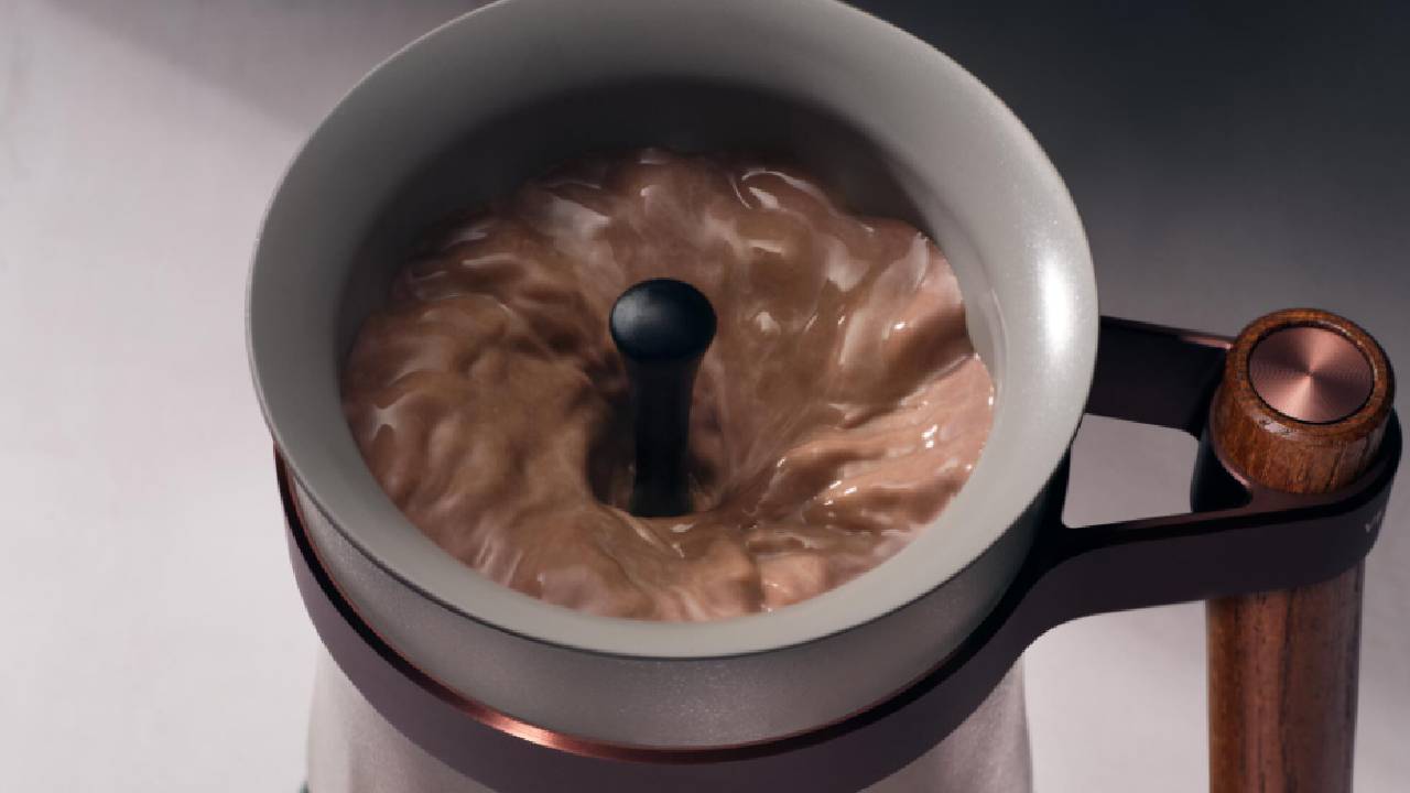A close up of the All-New Hotel Chocolat Velvetiser in use.