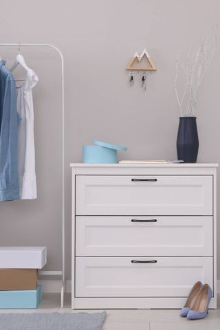 White draws and a clothes rail