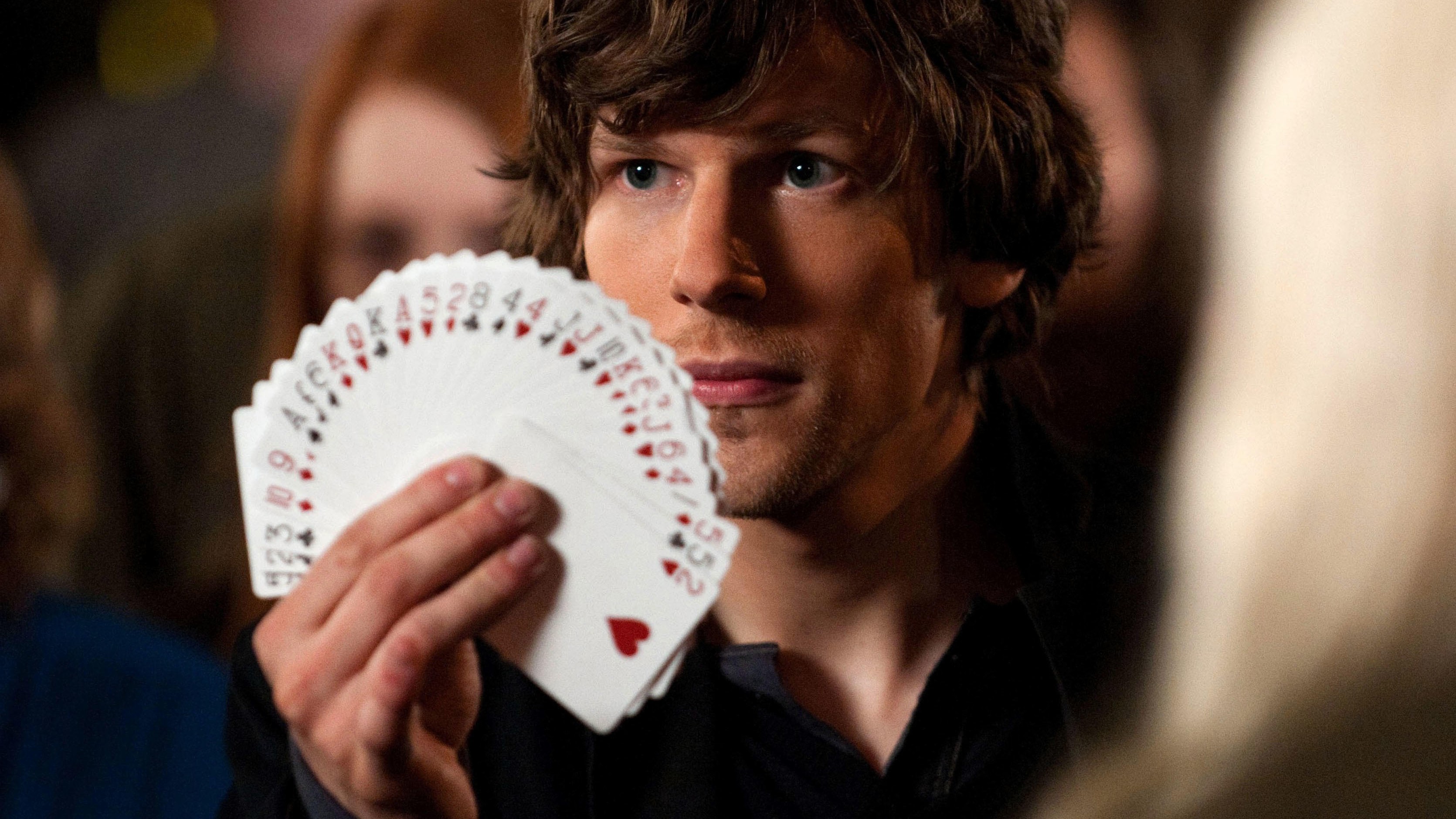 Daniel Atlas (Jesse Eisenberg) fans out a deck of cards in a scene from &quot;Now You See Me&quot;