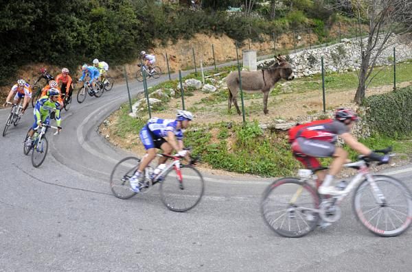Riders take a high speed downhill corner.
