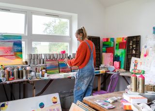 artist studio with vibrant modern artwork