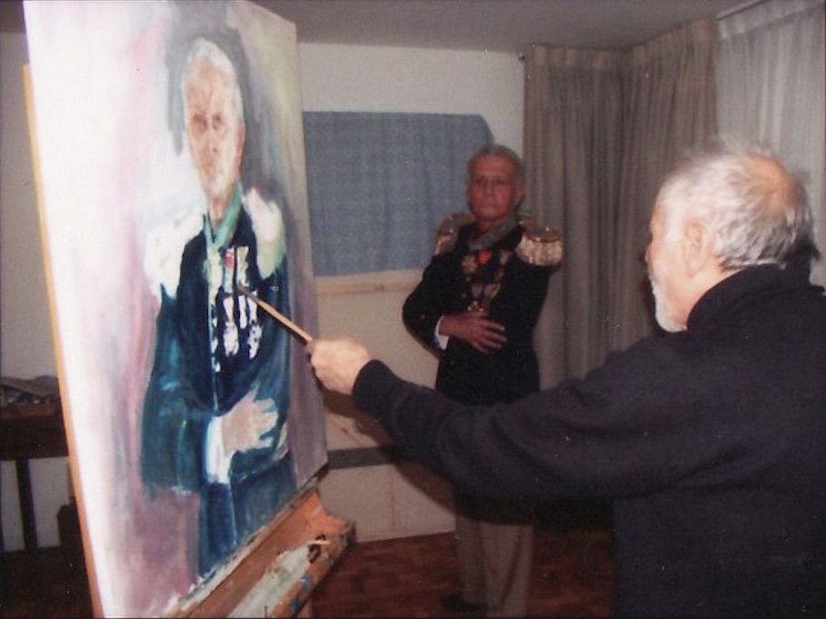 Spanish artist painting with left hand