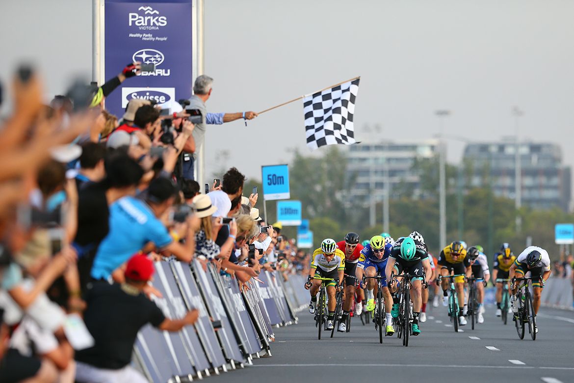 The riders sprint towards the line