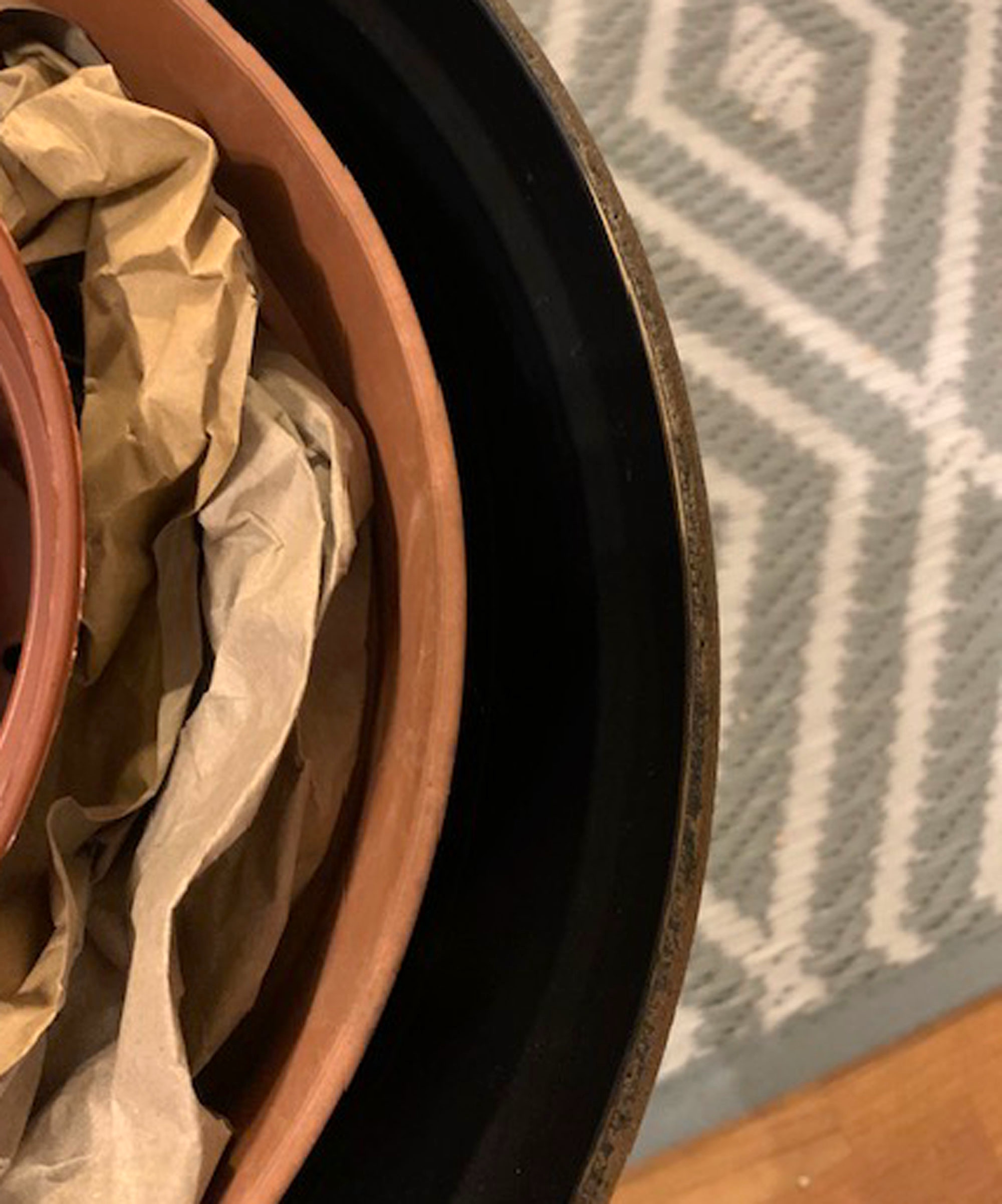 three separate containers with paper filling viewed from above