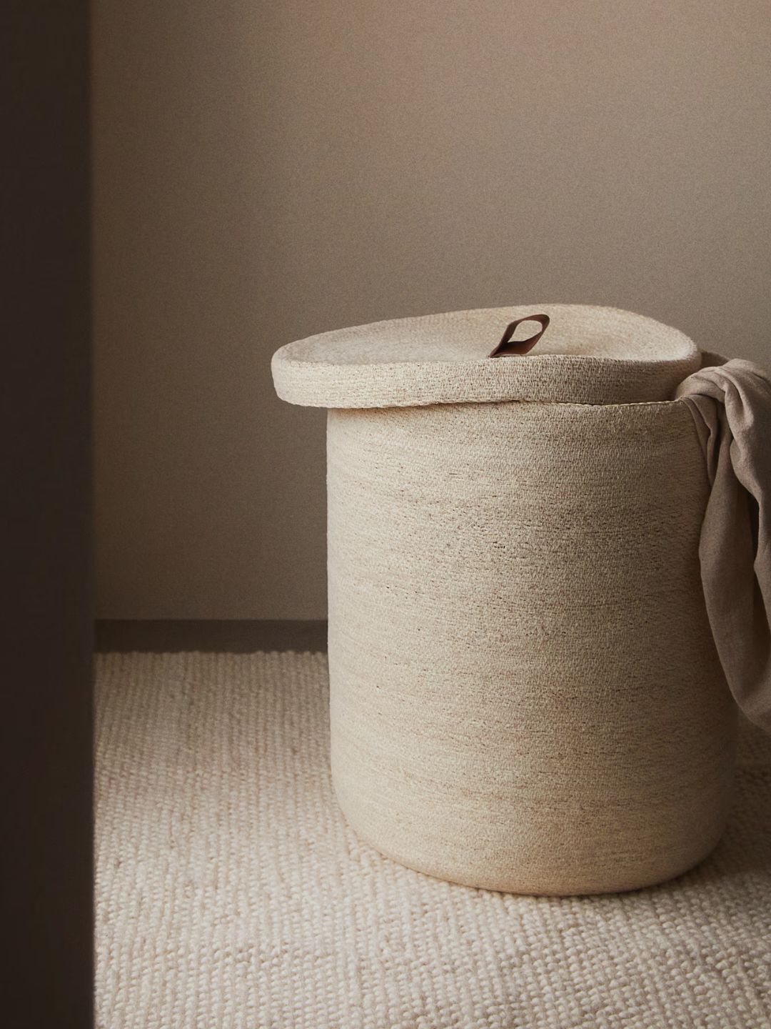 An extra-large seagrass laundry basket from H&amp;amp;M