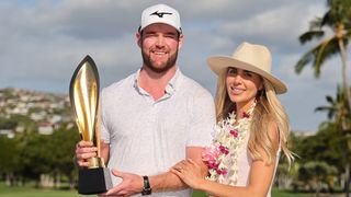 Grayson Murray and his fiancee Christiana pose with the Sony Open trophy