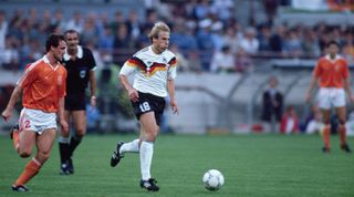 Jurgen Klinsmann of West Germany playing against the Netherlands at the 1990 FIFA World Cup