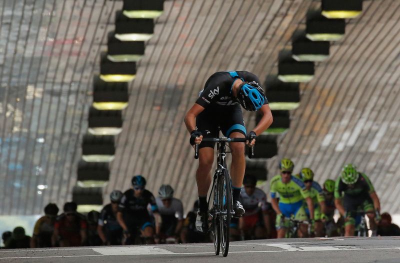 Danny Pate (Team Sky) checks his gap back to the peloton
