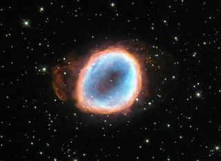 A "dying" star's last moments, captured by the Hubble Space Telescope. Over thousands of years it will cool and shrink until it becomes a white dwarf. One new study shows how the surviving cores of planets orbiting white dwarfs could emit radio waves, allowing scientists to detect them from Earth.