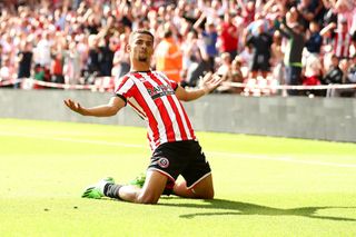 Iliman Ndiaye of Sheffield United celebrates after scoring their side's third goal during the Sky Bet Championship between Sheffield United and Blackburn Rovers at Bramall Lane on August 20, 2022 in Sheffield, England.