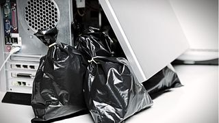 A concept image of computer trash spilling out of a desktop PC