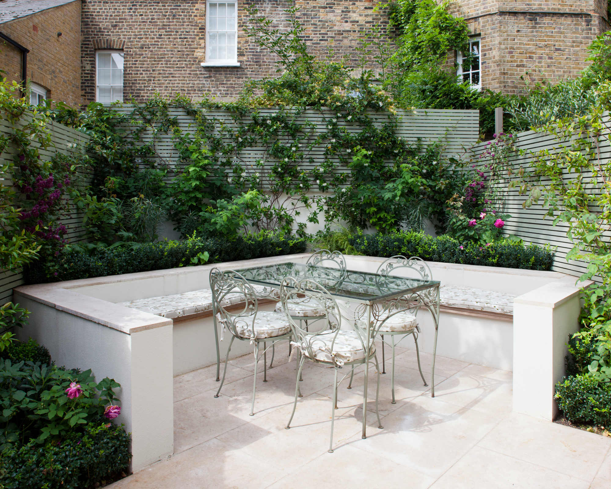 Garden seating area set an an angle to make a small garden look bigger with clever design