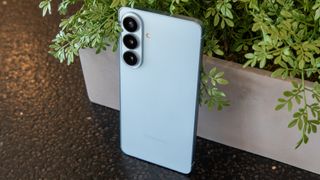 Galaxy S26 Plus in front of a planter