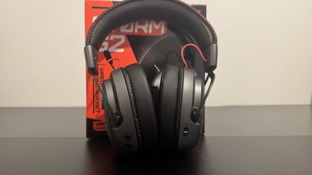 The OXS Storm G2 gaming headset on a black table