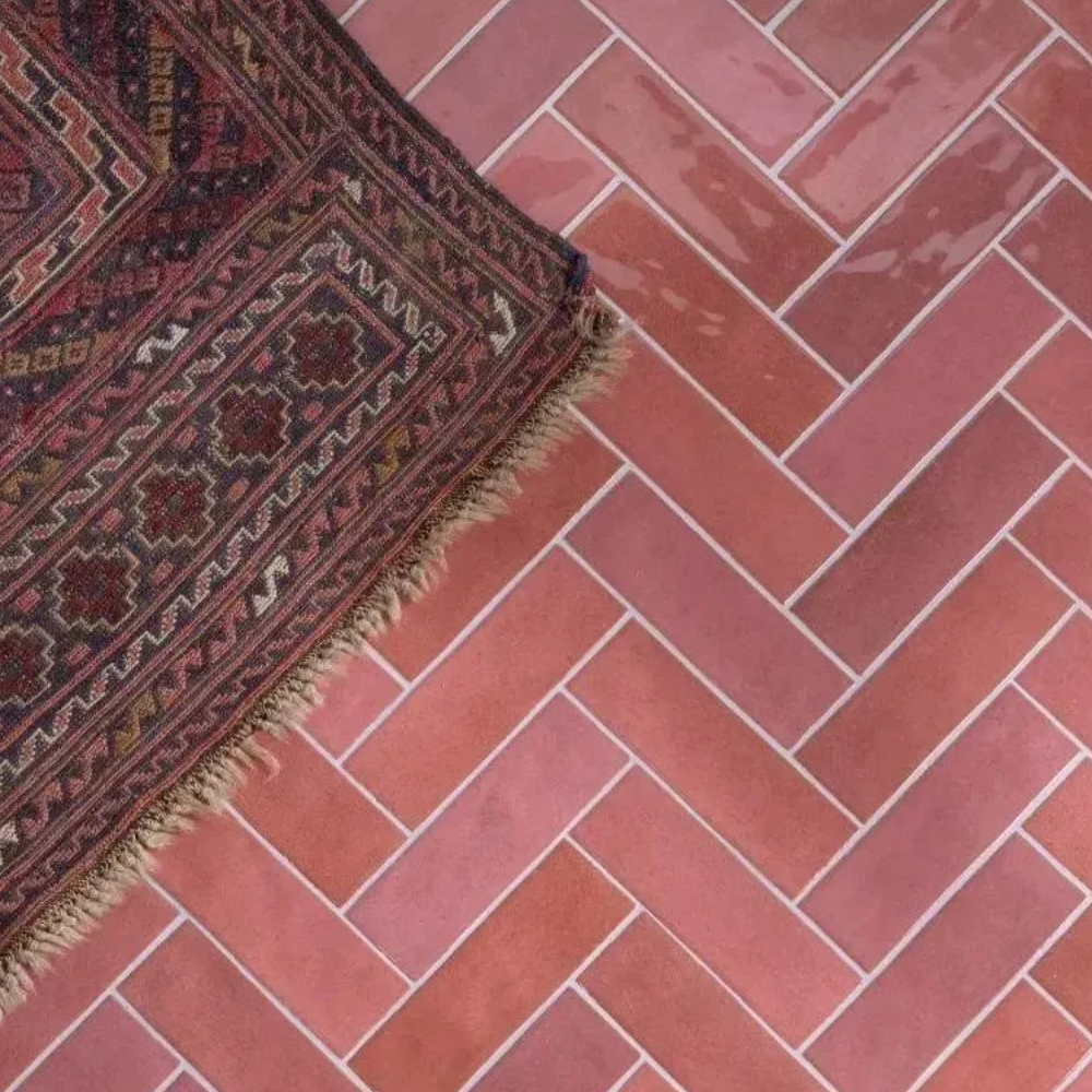 Little Italy Burgundy with a rug on it